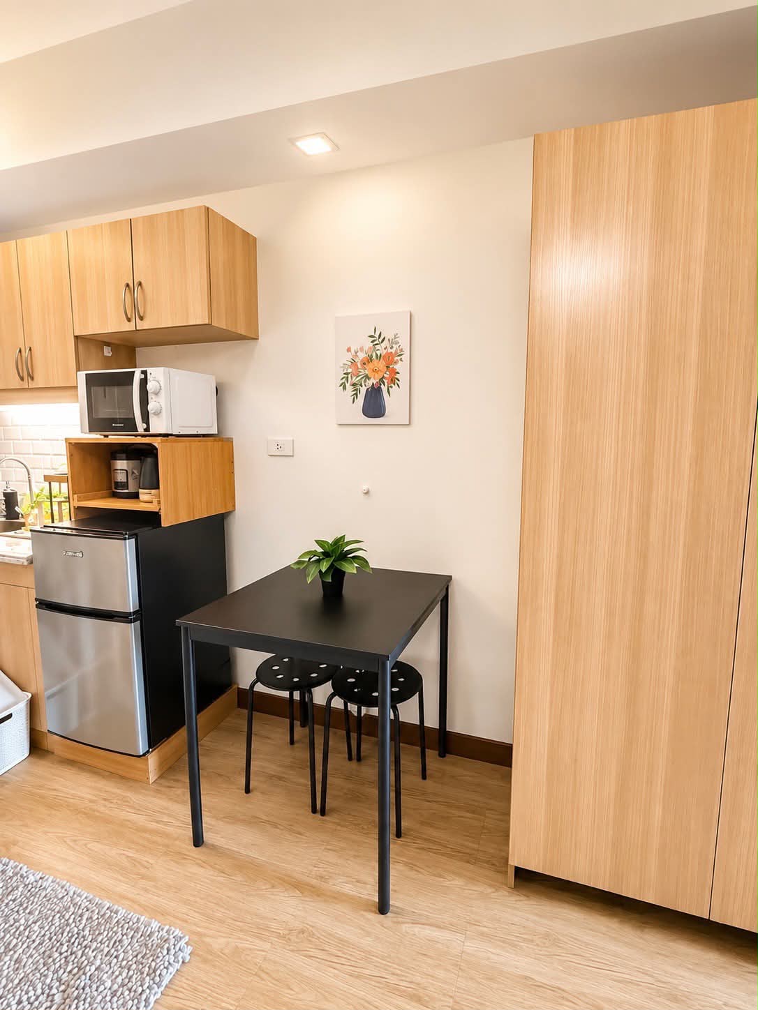 Work and dining table beside the kitchen